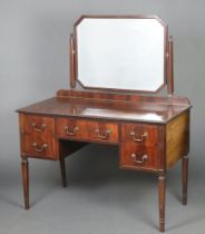 A 1920's Chippendale style mahogany dressing table with bevelled plate mirror fitted 1 long and 2