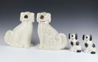 Two Victorian black and white Spaniels 14cm one A/F , a pair or large Victorian gilt decorated ditto