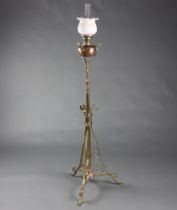 A Victorian copper and brass adjustable standard oil lamp with opaque shade, clear glass chimney