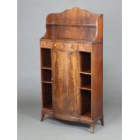 A Georgian style mahogany bow front bookcase with raised back fitted a shelf and recess above 1 long