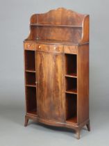 A Georgian style mahogany bow front bookcase with raised back fitted a shelf and recess above 1 long