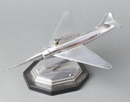A 1950's chrome table lighter in the form of a jet aircraftThe lighter is working
