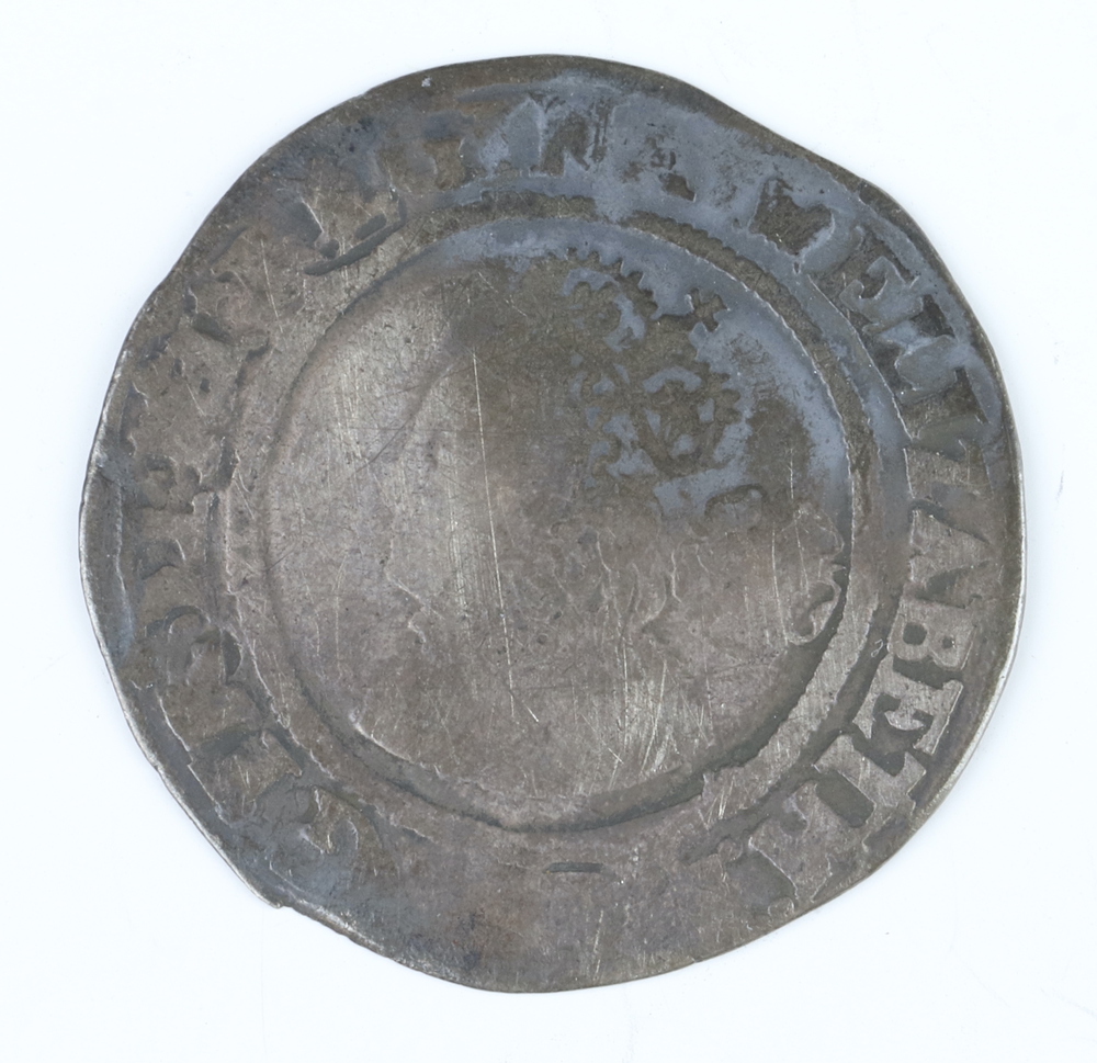 A silver sixpence of Queen Elizabeth I, third/fourth issue, dated 1566, two Scottish hammered silver