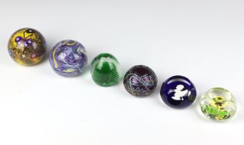 A Selkirk glass paperweight decorated with butterflies 8cm, a Whitefriars ditto 8cm and 4 other