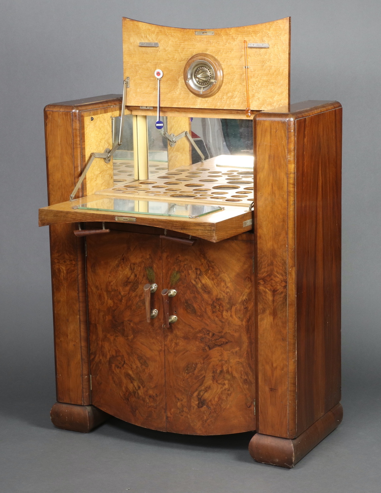 In the manner of Epstein, an Art Deco figured walnut cocktail cabinet with hinged lid and cupboard - Image 2 of 3