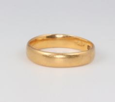 A 22ct yellow gold wedding band size L, 3.4 grams