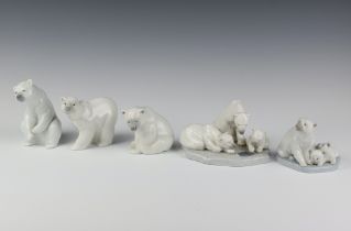 A Lladro group of 3 polar bears 1443 9cm, ditto 8cm, a seated polar bear 9cm, ditto 12cm and a