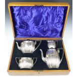 A silver 4 piece demi-fluted tea and coffee set with ebony mounts, Sheffield 1920, 1705 grams gross,
