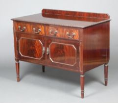 A 1930's Chippendale style wash stand with raised back, fitted 2 long drawers with swan neck drop