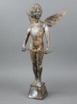 A 20th Century metal figure of a standing cupid with arrow, raised on a square tapered base 61cm h x