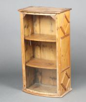 A Victorian pine bow front shop display cabinet 97cm h x 54cm w x 35cm d Top is slightly warped,