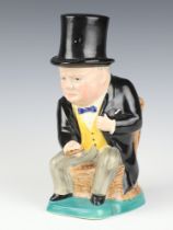 A Kirklands Etruria character jug in the form of seated Winston Churchill with removable top hat