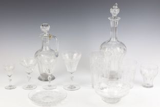 A suite of cut glass tableware comprising 11 liqueurs, 12 sherry glasses, 10 small wines, 12 large