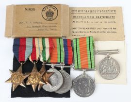 A World War II medal group comprising 1939-45 Africa and Italy Stars, Defence and War medal,