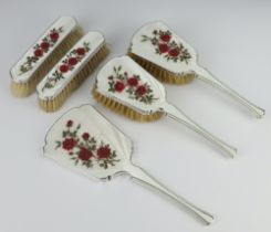 A 5 piece silver and guilloche enamel dressing table set Birmingham 1979 comprising 2 hair