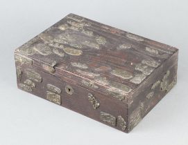 A Japanese rectangular hardwood box with hinged lid decorated embossed metal plaques 9cm x 28cm x