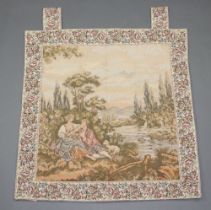 A machine made tapestry panel depicting a seated couple by mountain lake 81cm x 79cm
