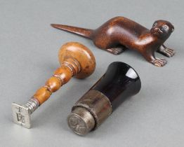 A 19th Century steel seal decorated a stork, 1 other seal with turned wooden handle 8cm and a carved