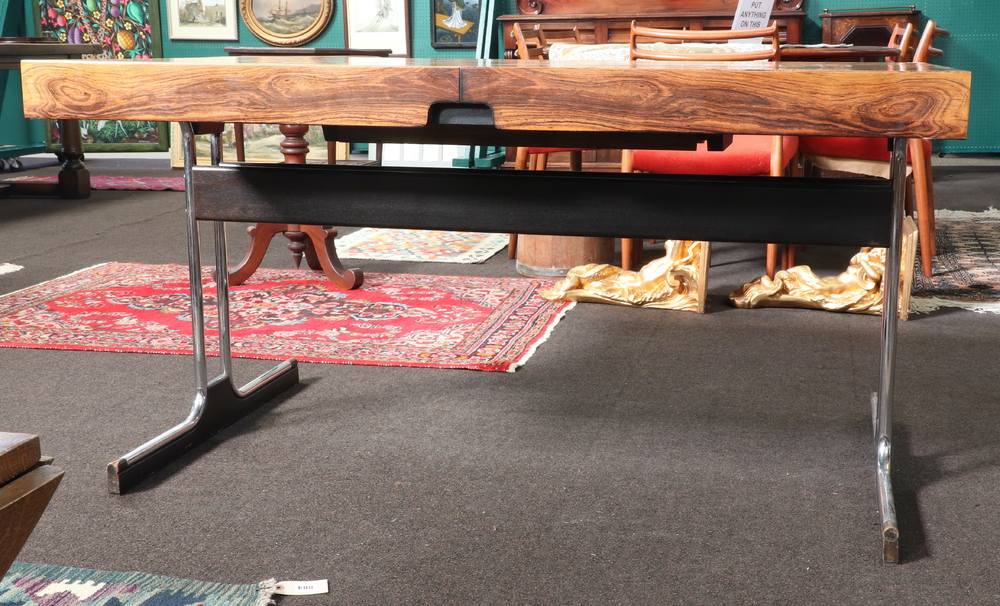 A 1970's Pieff style rosewood extending dining table, raised on figured chrome supports with - Image 6 of 7