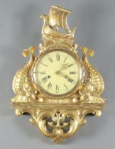 A Continental Cartel clock with 16cm painted dial, Roman numerals and pierced gilt hands,