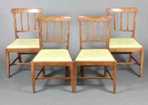 A set of 4 19th Century elm stick and bar back kitchen chairs with upholstered drop in seats