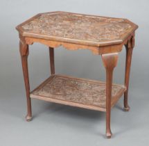 A Victorian deeply carved oak octagonal occasional table raised on club supports with rectangular