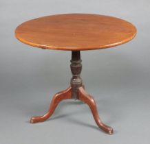 A 19th Century circular snap top tea table raised on turned column and tripod base 71cm h x 83cm