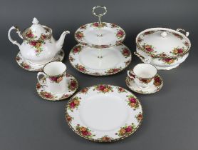 An extensive Royal Albert Old Country Roses tea, coffee and dinner service comprising 13 tea cups,