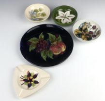 A modern Moorcroft cream ground Columbine ashtray together with 3 small bowls 15cm and a modern