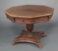 A Victorian style "cherry" octagonal pedestal table, fitted 4 frieze drawers, raised on a reeded