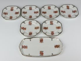 Six Bavarian tea plates and a sandwich plate decorated with playing cards