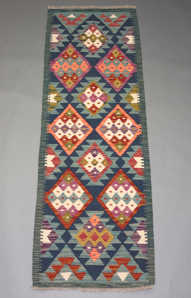 A green, tan and white ground Maimana Kilim runner with all over diamond design 188cm x 66cm