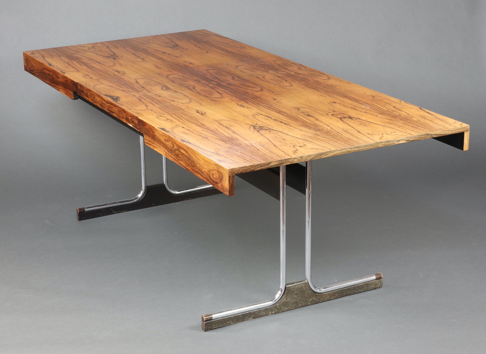 A 1970's Pieff style rosewood extending dining table, raised on figured chrome supports with - Image 2 of 7