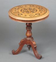 A Victorian circular inlaid walnut snap top occasional table, raised on a turned tripod and column