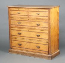 A Victorian satinwood? chest of 2 short and 3 long drawers with bevelled top, raised on a platform