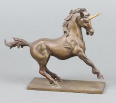 A bronze figure of a unicorn raised on a rectangular base 14cm x 19cm x 6cm