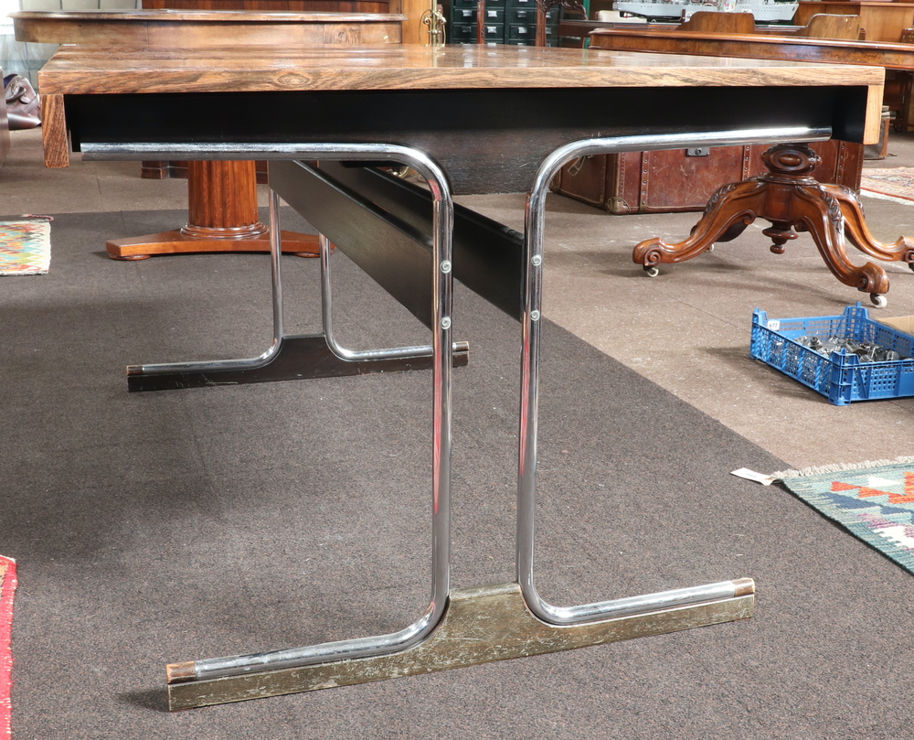 A 1970's Pieff style rosewood extending dining table, raised on figured chrome supports with - Image 4 of 7