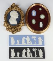 A pair of Wedgwood Jasper plaques, black basalt and pale blue basalt 22cm, 5 mounted plaques in an