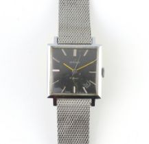 A gentleman's steel cased vintage Sekonda wristwatch with calendar aperture at 5 o'clock on a mesh
