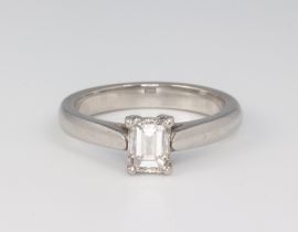 A platinum, emerald cut single stone diamond ring approx. 0.5ct, the colour G/H, clarity SI1, 5.6