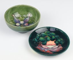 A Moorcroft pale green bowl decorated with flowers 11cm together with a modern green ground dish