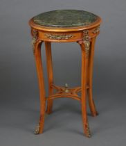 A circular Empire style bleached mahogany occasional table with green veined marble top and gilt