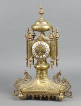 A handsome French 19th Century 8 day striking on bell mantel clock contained in a shaped gilt