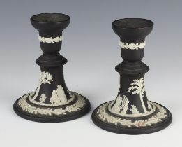 A pair of Wedgwood black basalt candlesticks 12cm