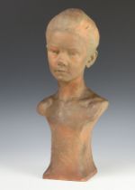Louis Albert Carvin 1909 (1875-1951), a terracotta bust of a young girl, incised marks, 46cm There