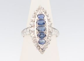 A white metal marquise sapphire and diamond ring, the sapphires approx. 1ct, brilliant cut