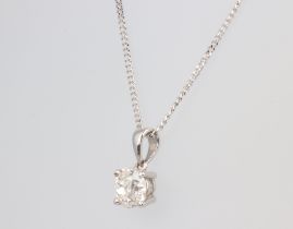 A white metal mounted diamond pendant approx. 0.5ct on a 9ct white gold 44cm chain