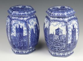 A pair of Maling ware blue and white hexagonal tea caddies for Ringtons Ltd depicting views of