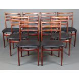 Skovby, a set of 8 rosewood ladder back dining chairs by Skovby, upholstered in black rexine 85cm