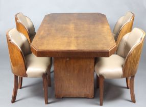 In the manner of Epstein, an Art Deco "cloud" walnut dining suite in the manner of Epstein
